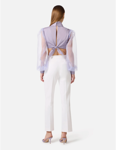 Shirt with tied belt at the back